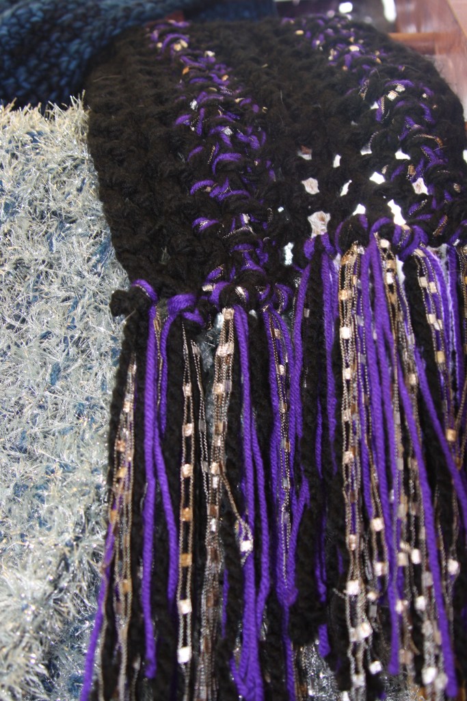 The purple shawl is about how the unknown might be better than the known, the silver is about compassion