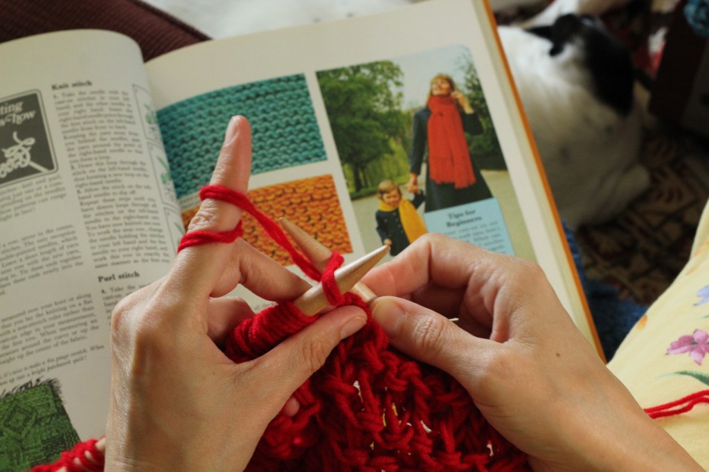 Getting inspired by the Creative Hands book. Photo by Derek Howard.