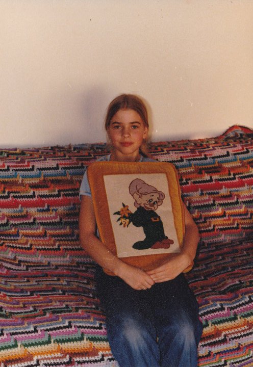 Me with my mom's needlepoint pillow